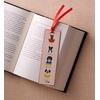 RIFLE PAPER CO. Book Club Bookmark 6″ L x 1.75″ W, Saffiano PU with a Grosgrain Ribbon, Metallic Gold Foil Logo, Perfect for Book Lovers, Writers, & Readers(Studious Dogs)